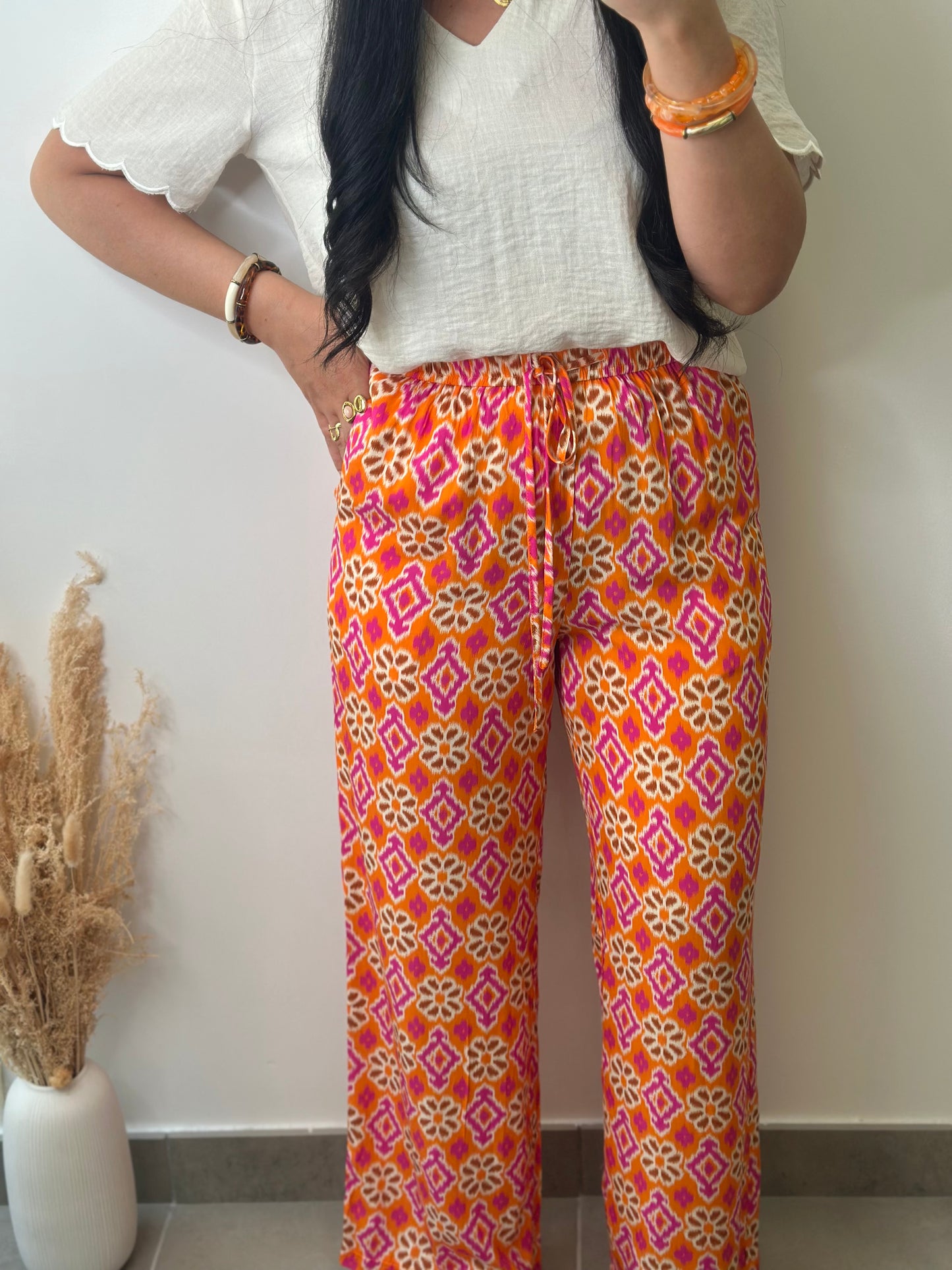 Pantalon élastique en viscose à imprimé orange et rose