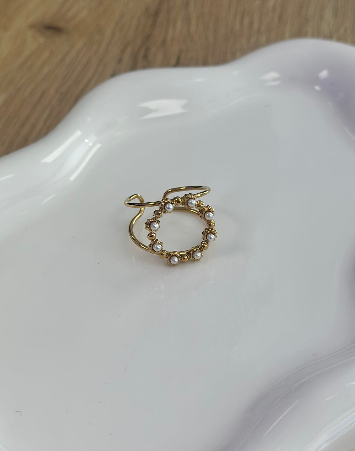 Bague dorée rond perlé