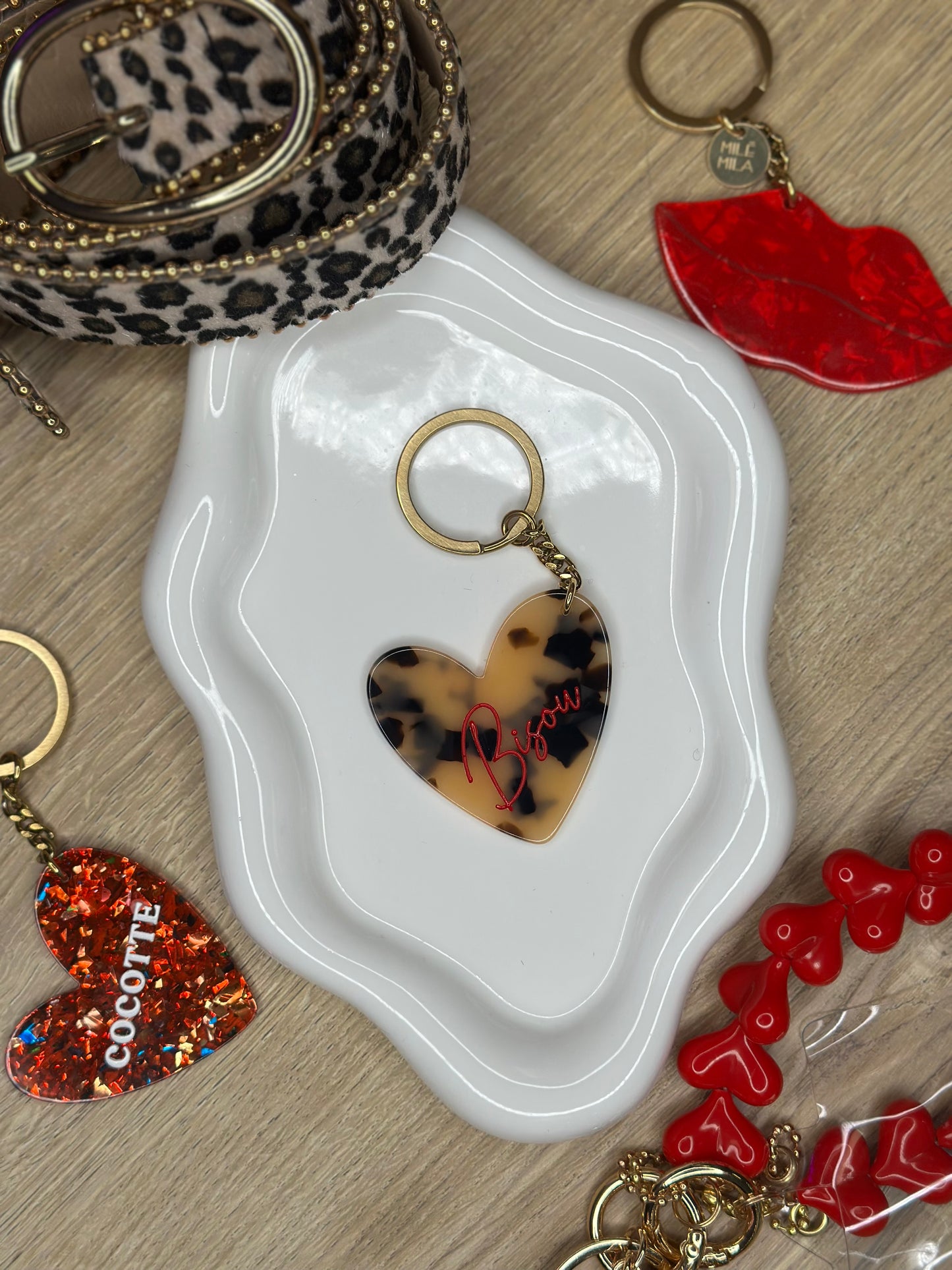 Porte clefs en coeur léopard - BISOU