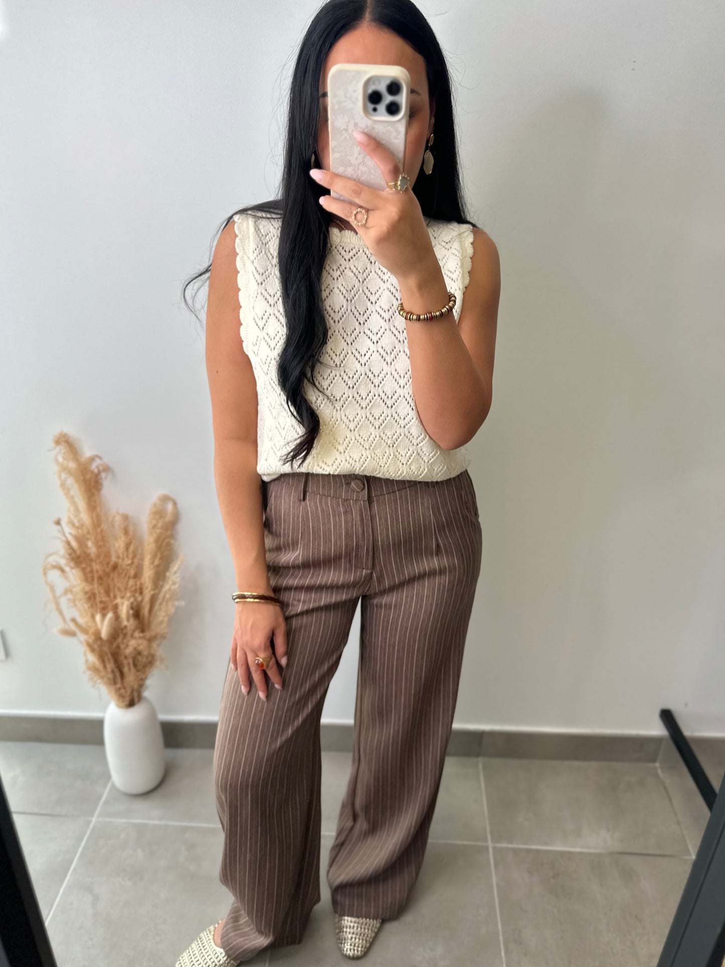 Pull sans manches ajourée à motifs