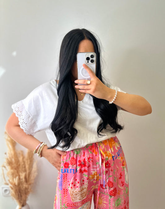 T-shirt blanc en coton avec manches ajourées