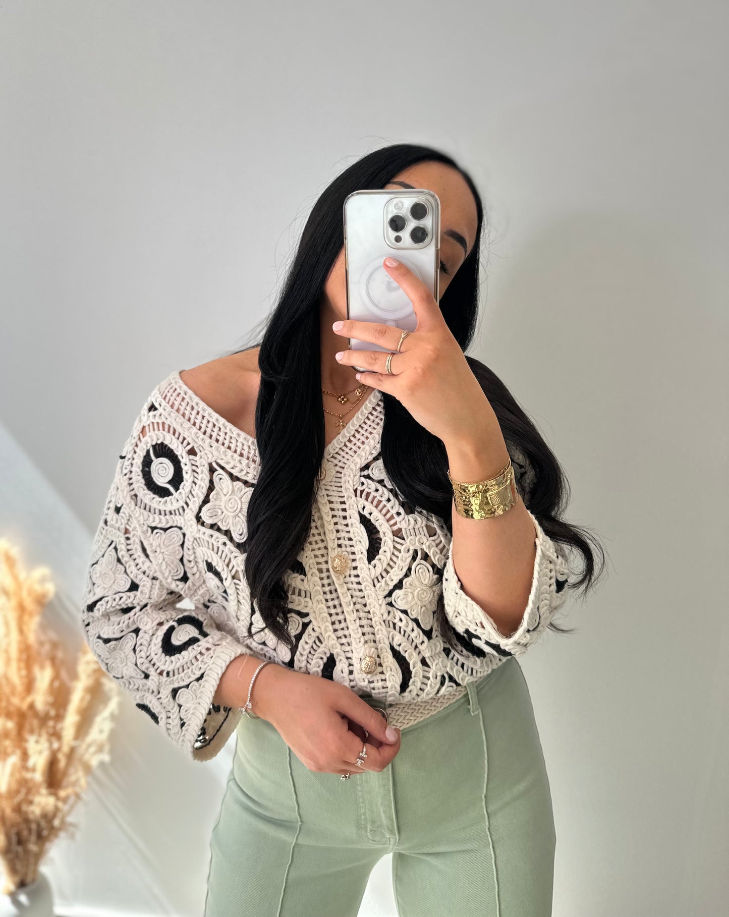 Gilet à crochets et boutons dorés