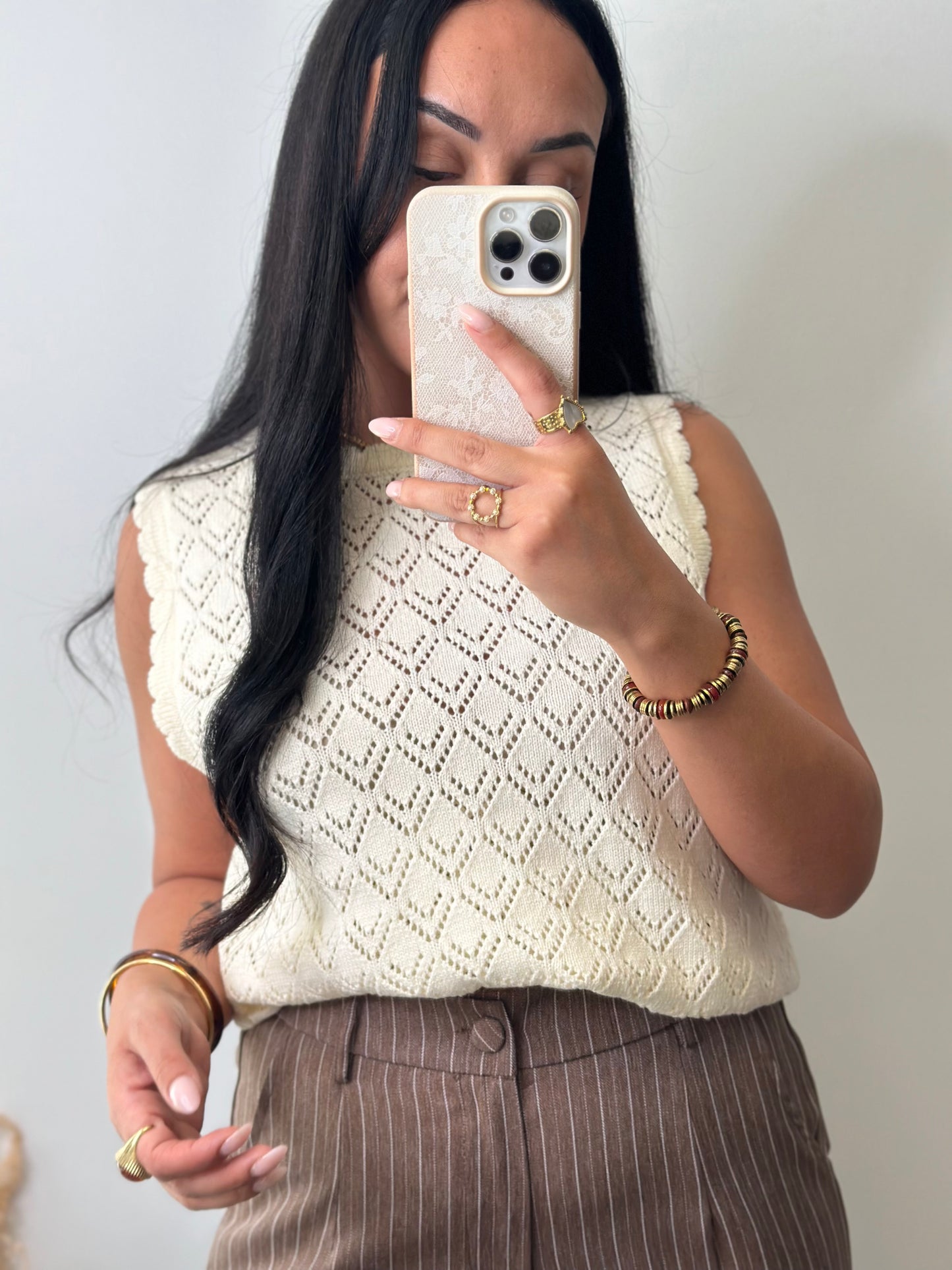 Pull sans manches ajourée à motifs