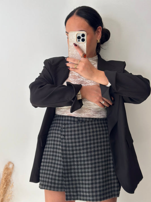 Jupe-short à carreaux et boutons