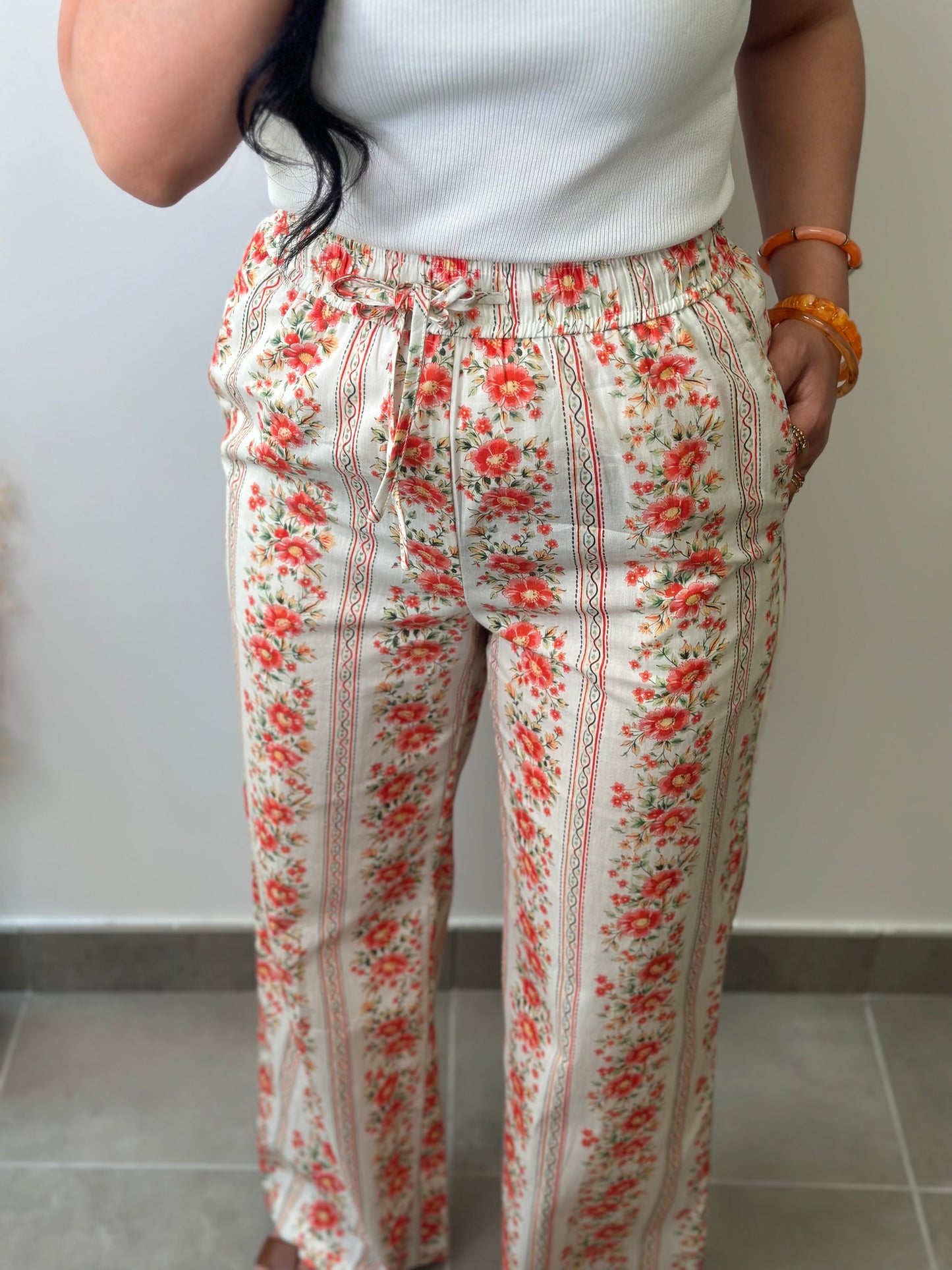 Pantalon en coton à motifs fleuries orange
