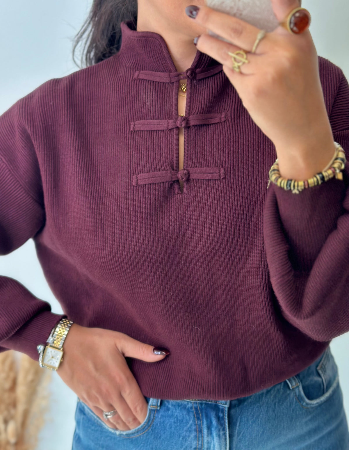 Pull bordeaux à brandebourgs