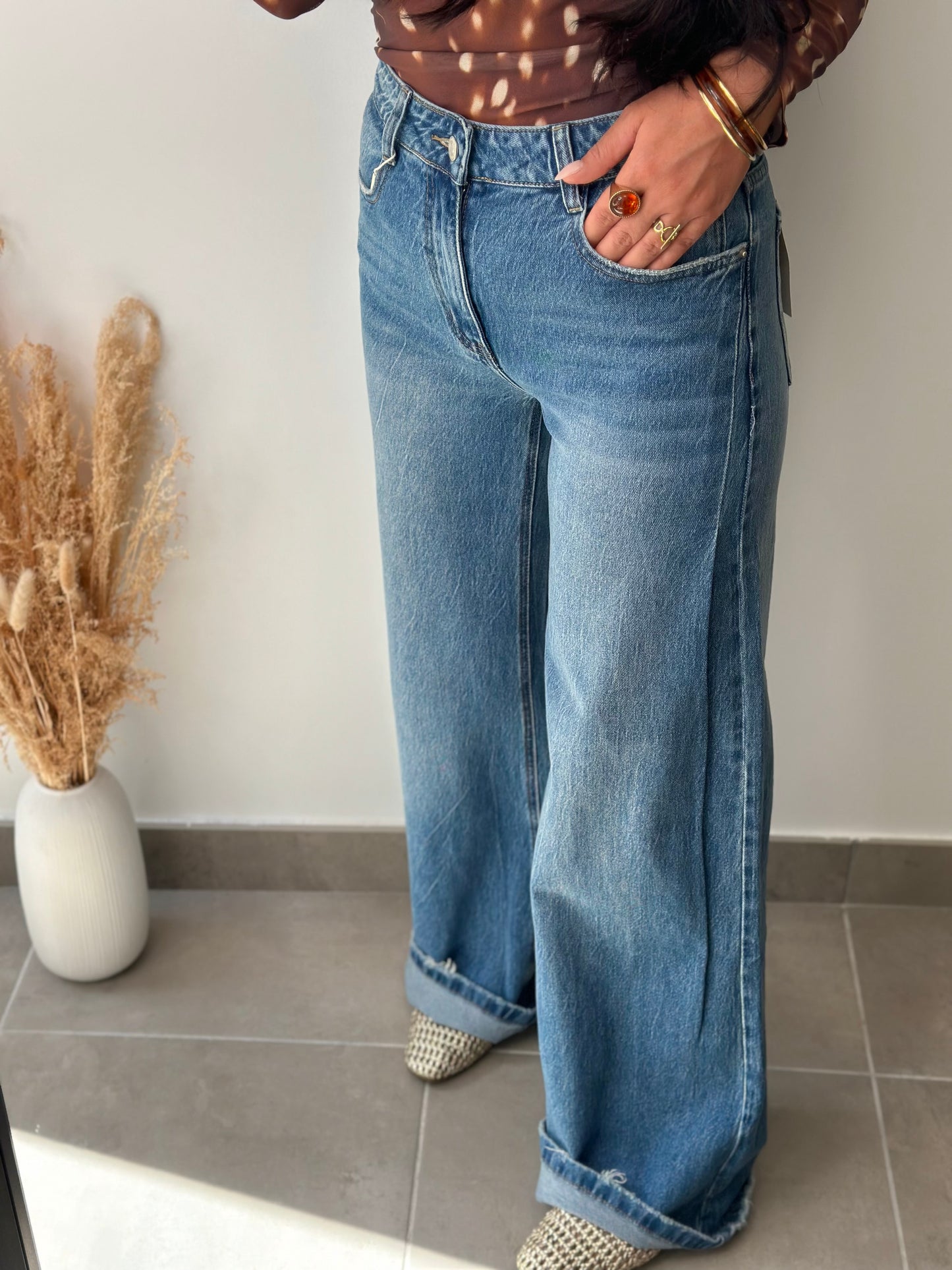 Jean large à détails sur le côté