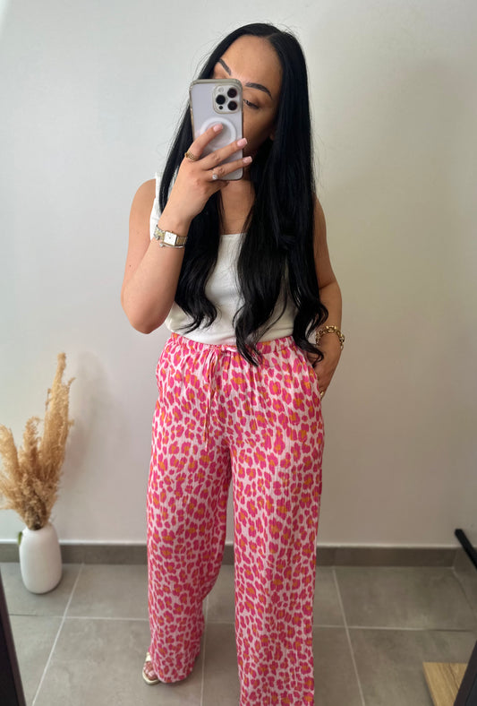 Pantalon à motifs léopard rose