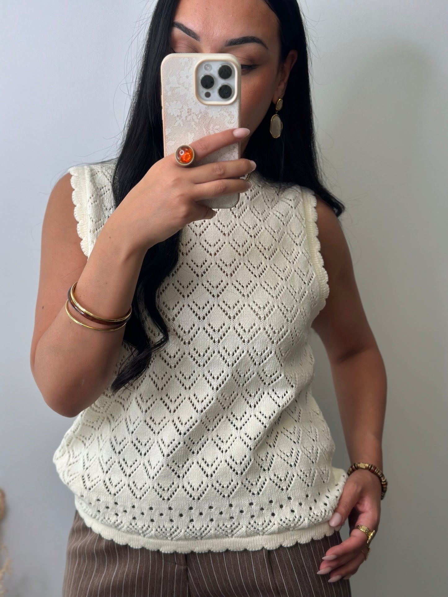 Pull sans manches ajourée à motifs