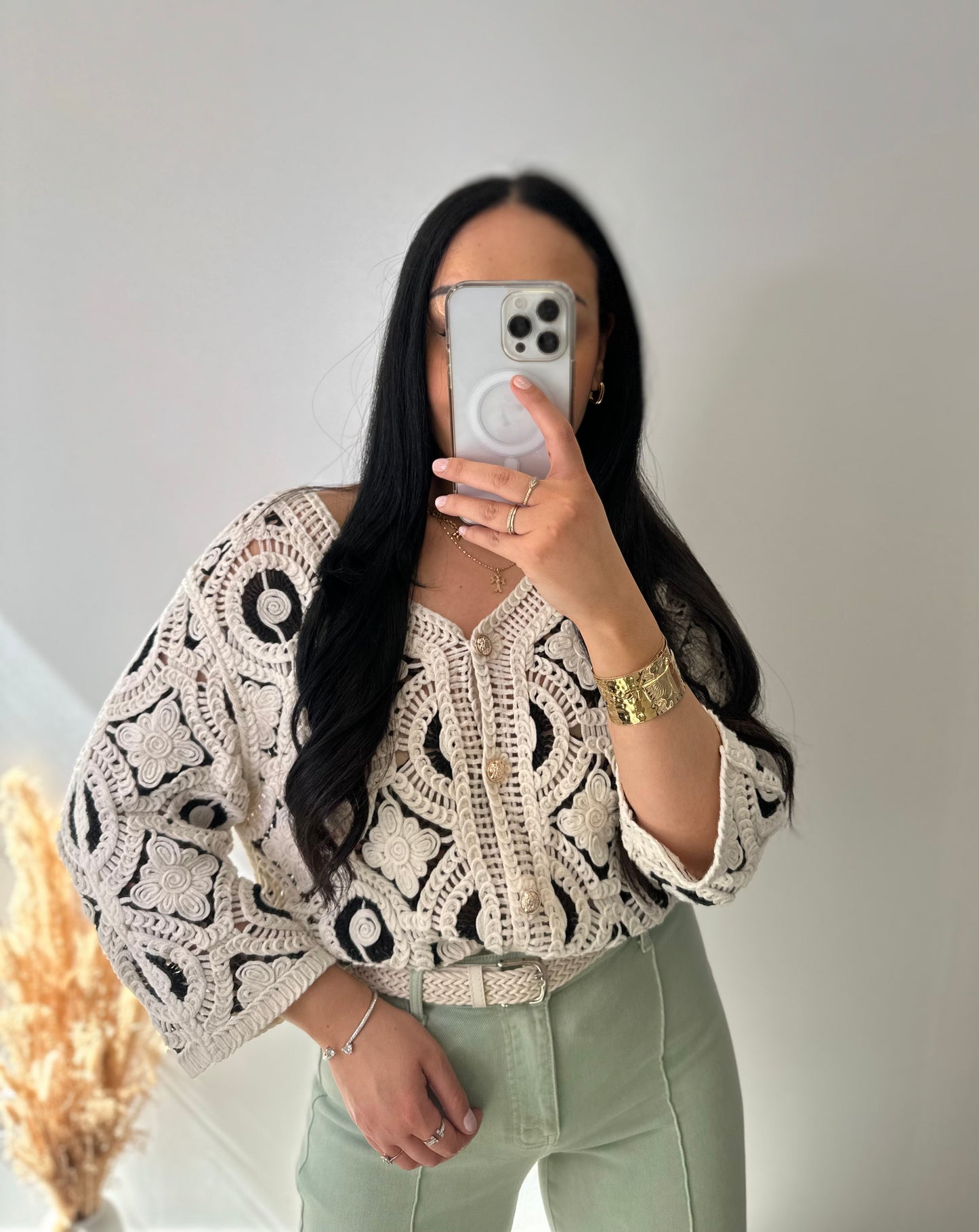 Gilet à crochets et boutons dorés