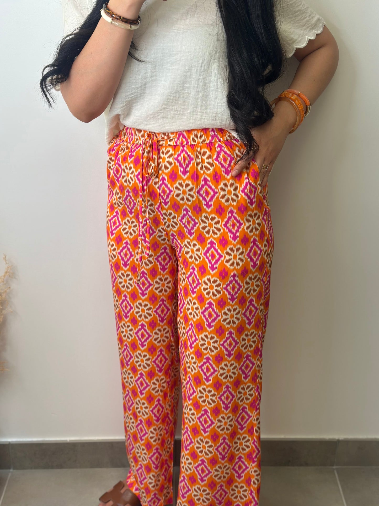Pantalon élastique en viscose à imprimé orange et rose