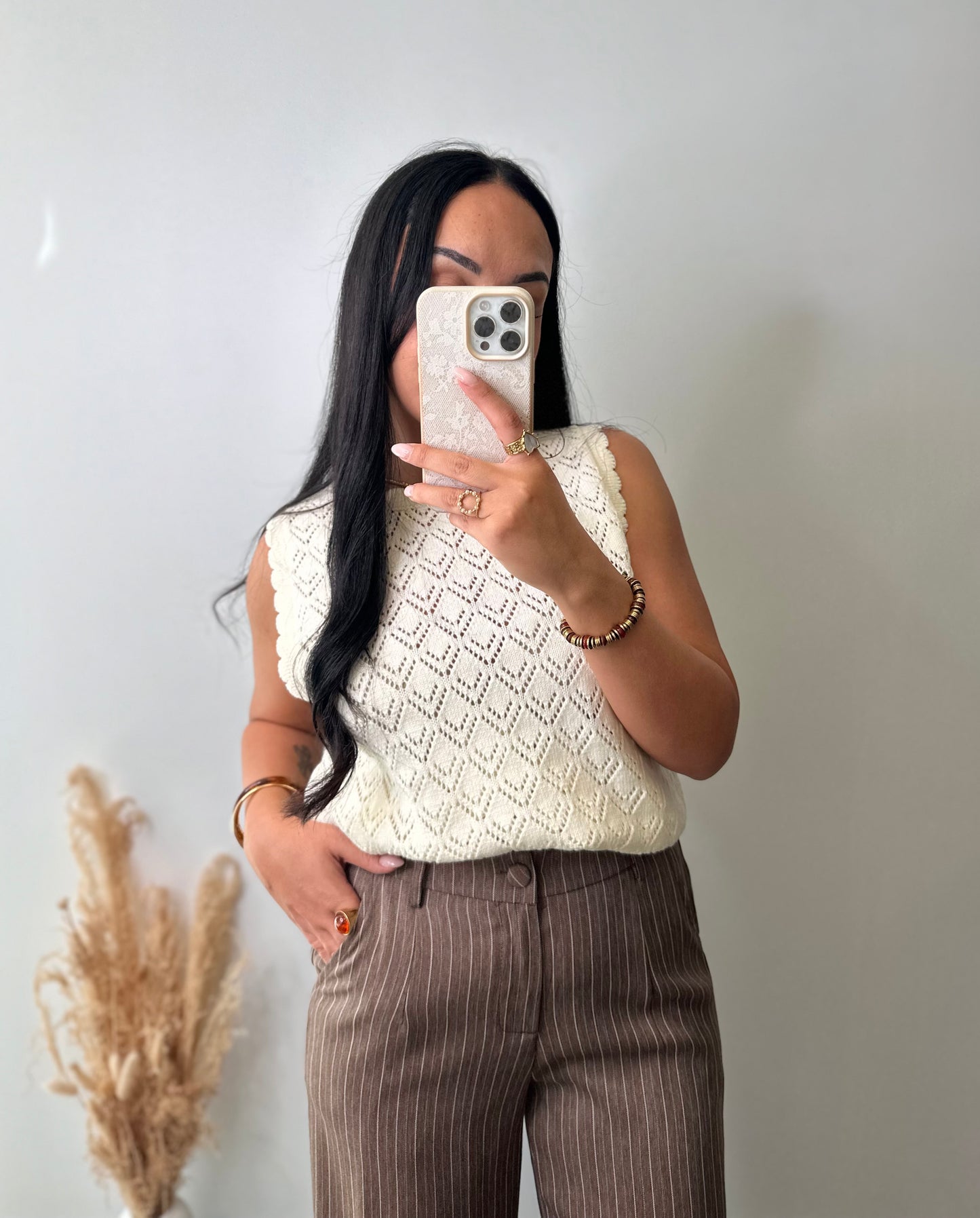 Pull sans manches ajourée à motifs